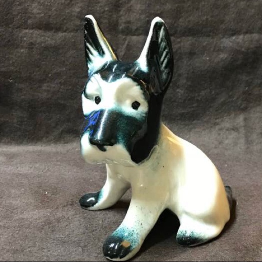 Vintage figurine of adorable black and white dog
